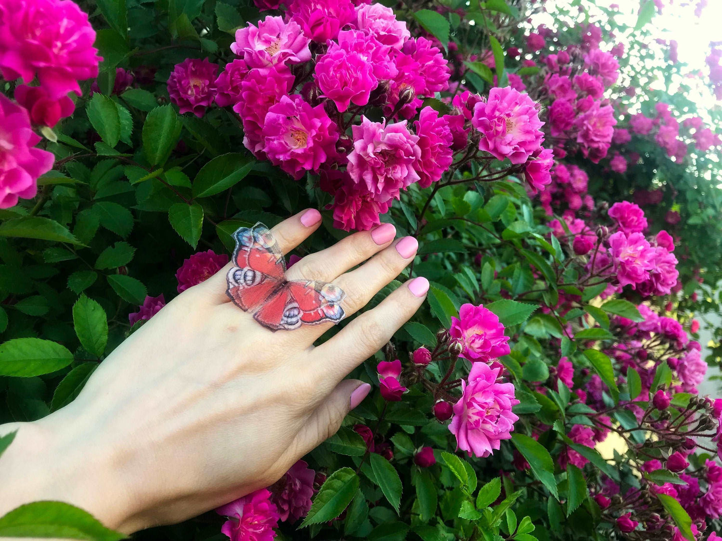 Unique peacock feather detailing on butterfly ring