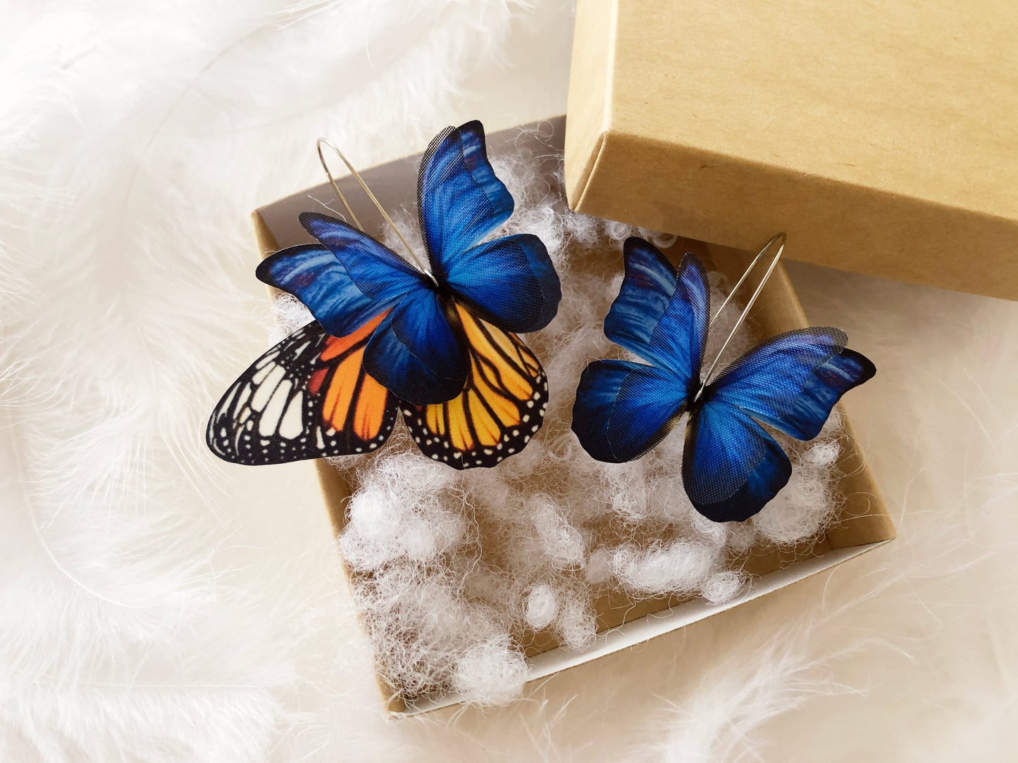 Boho chic earrings featuring colorful fabric butterfly wings