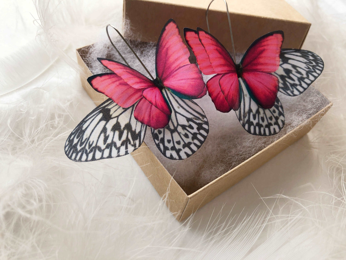 Quirky oversized earrings with fairy wing design
