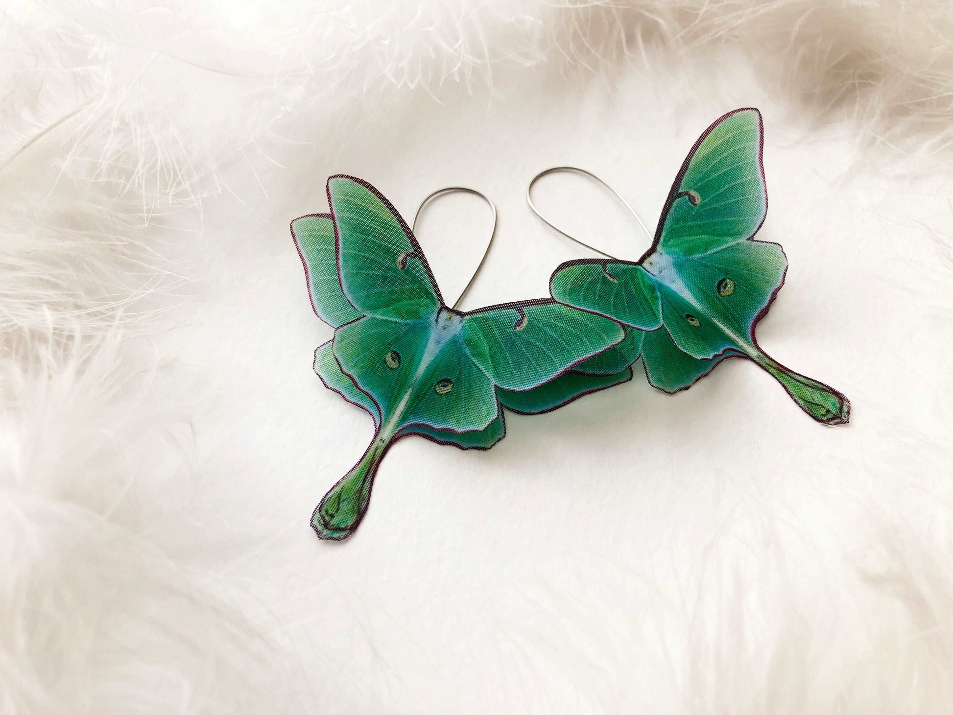 Silk Luna Moth Earrings with sterling silver base on white background