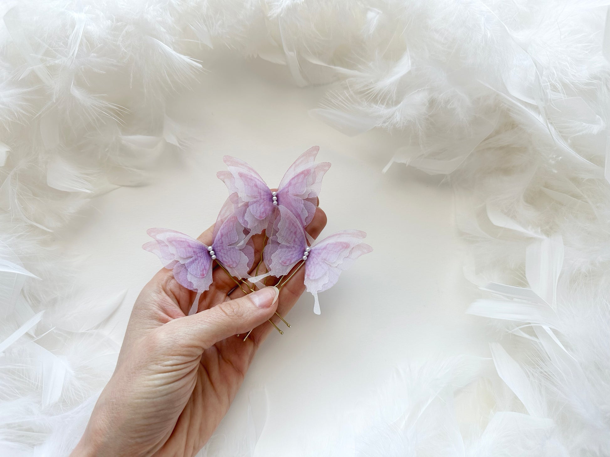 Butterfly clips with intricate details perfect for flower girls and bridesmaids