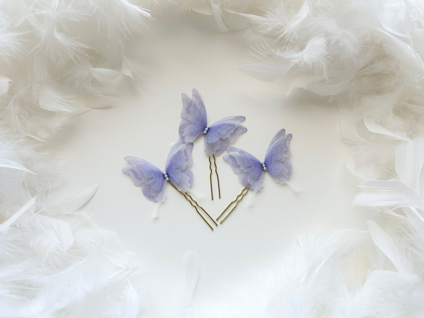 Set of three unique silk butterfly hairpins for a whimsical touch