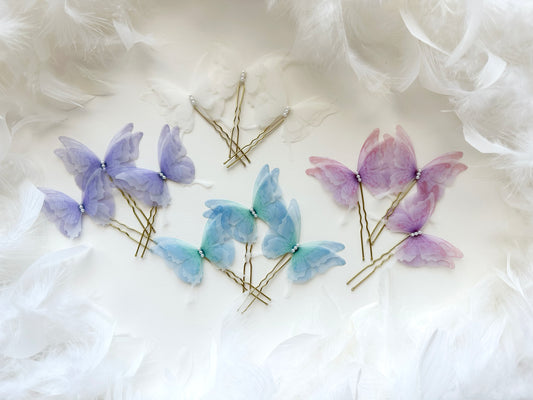 Delicate pink silk butterfly hairpin for weddings and special occasions