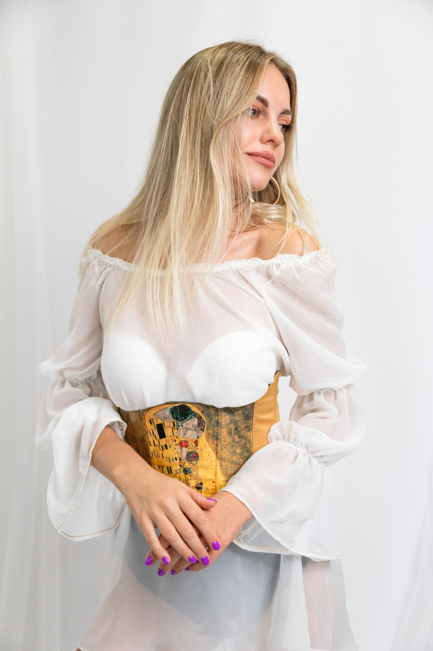 Glamorous waist belt with a wide design and adjustable fit, side view