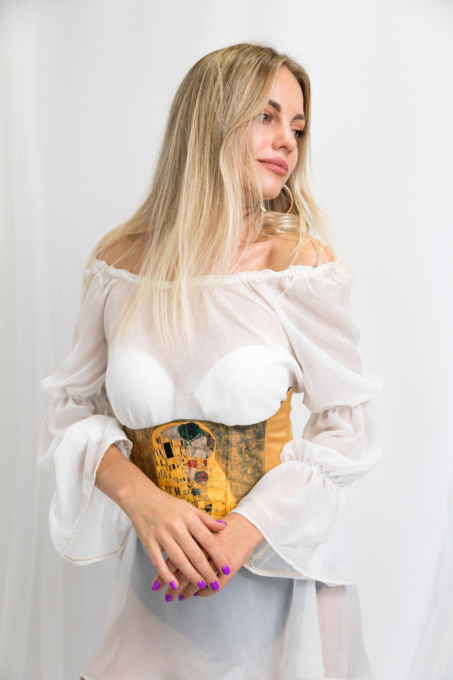Glamorous waist belt with a wide design and adjustable fit, side view