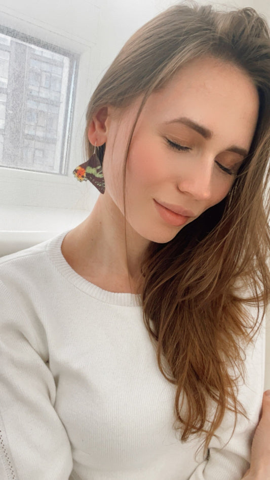Gothic earrings featuring colorful Urania Sunset Moth wings