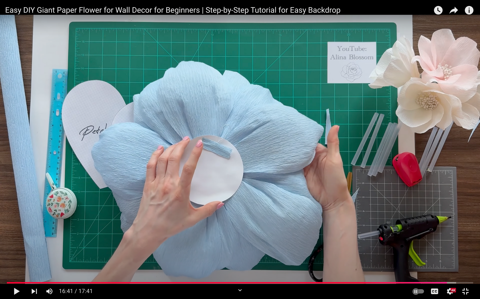 Giant Paper Flower tutorial on YouTube Channel Alina Blossom featuring the backside and wall hanger