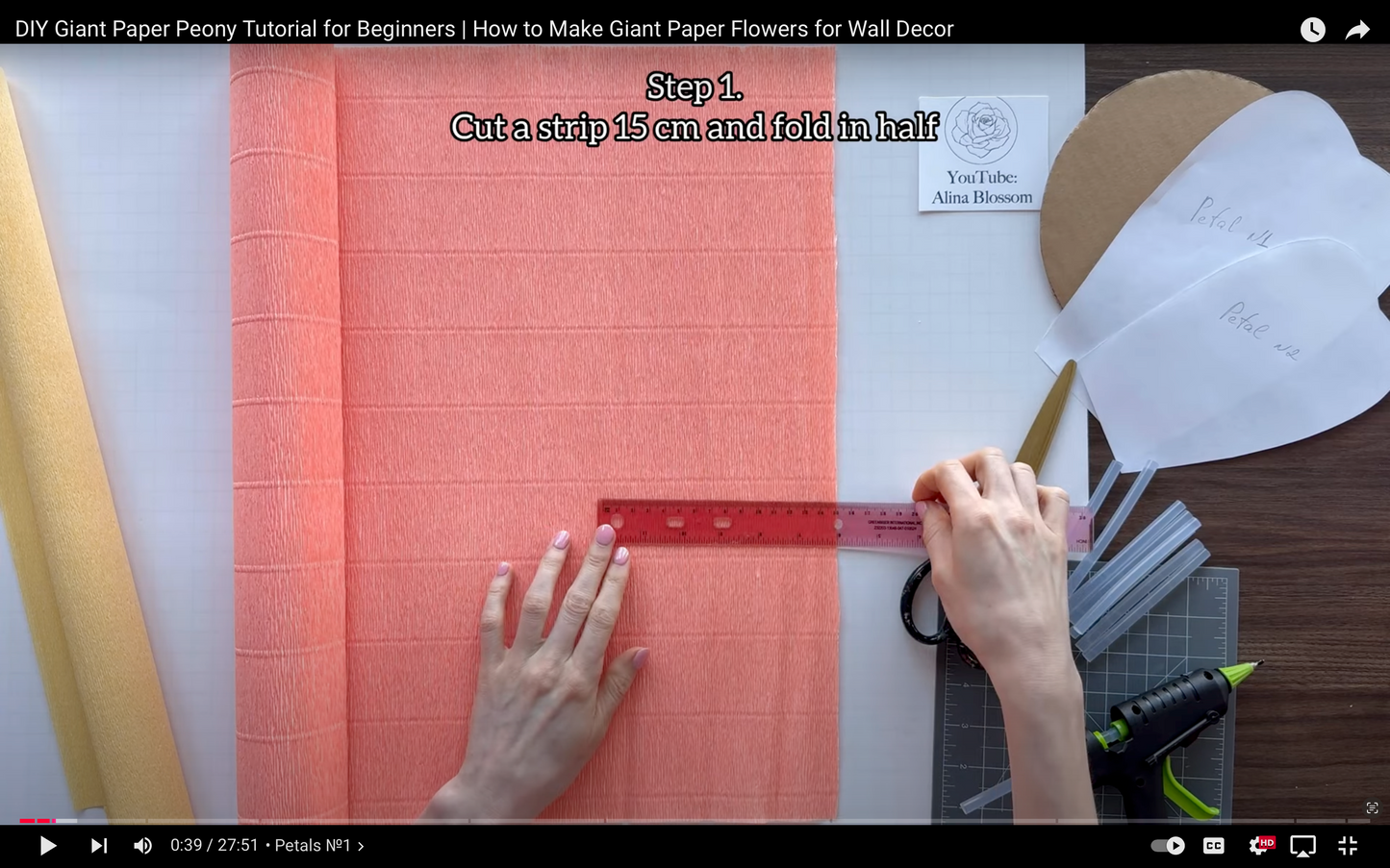 Step-by-step tutorial on making giant paper flowers with materials and tools.