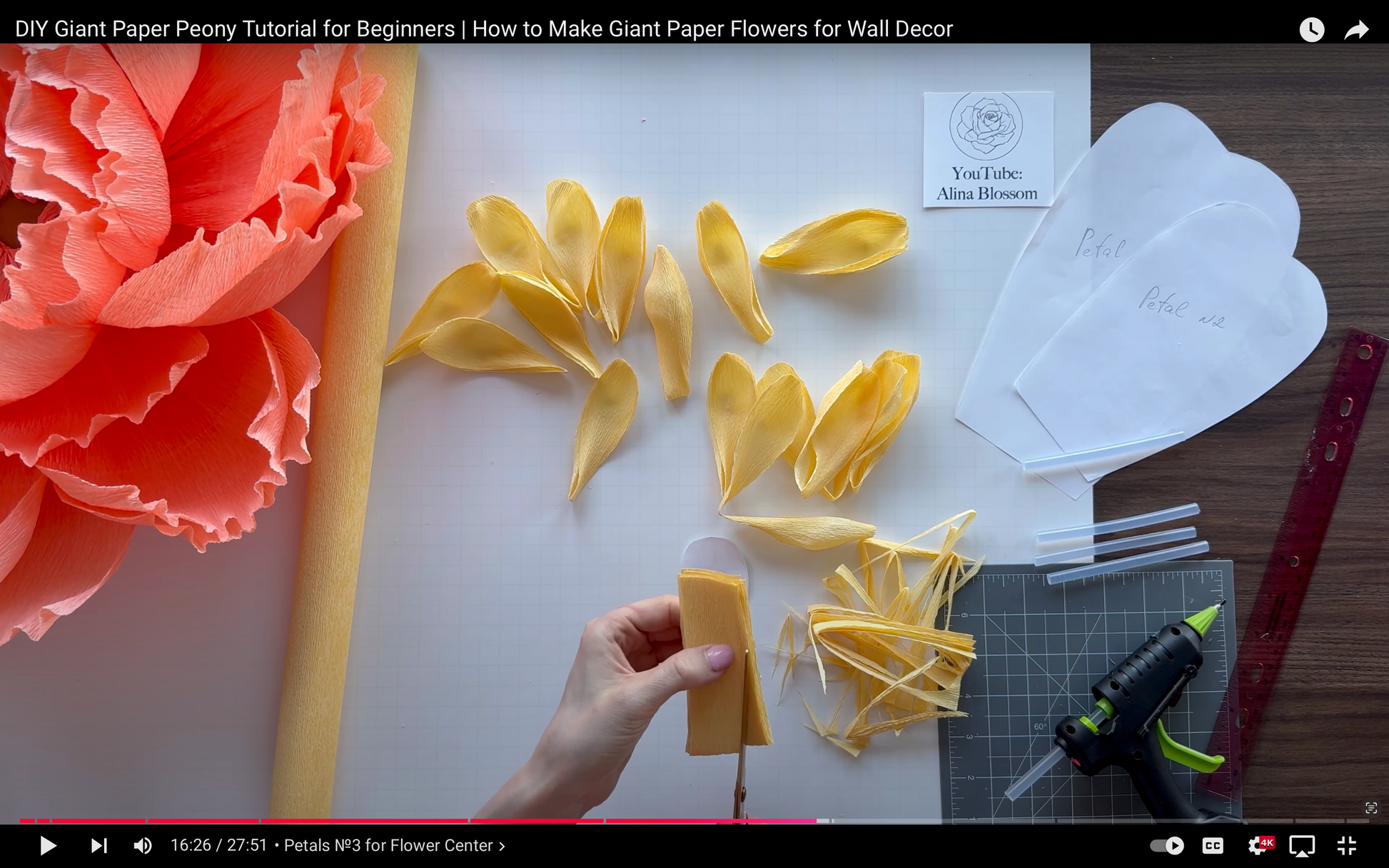 DIY Giant Paper Flower Tutorial with materials on a table