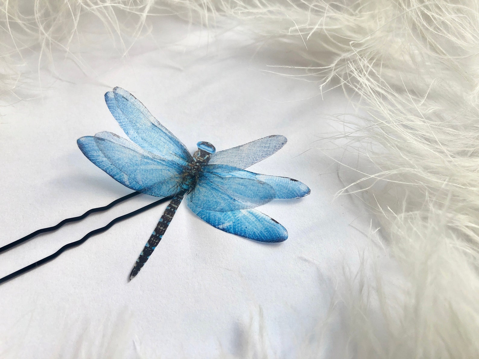 Blue dragonfly hair clip with translucent silk wings, ideal for bohemian styles