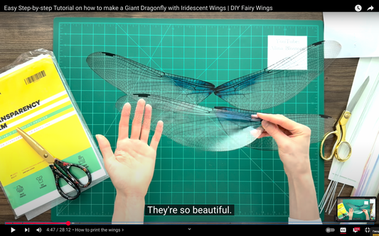 Step-by-step tutorial on making a Giant Dragonfly with iridescent wings on a cutting mat.