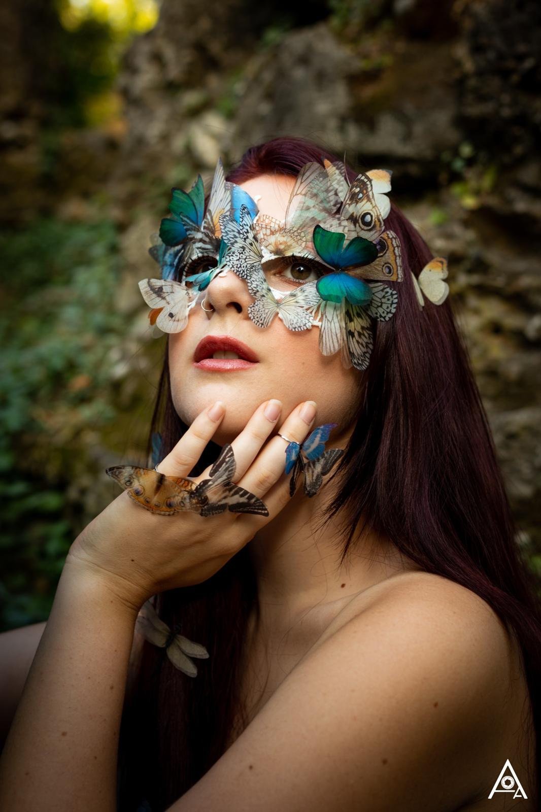 Red Hair Girl Wears Mask with Butterflies and Butterfly Rings