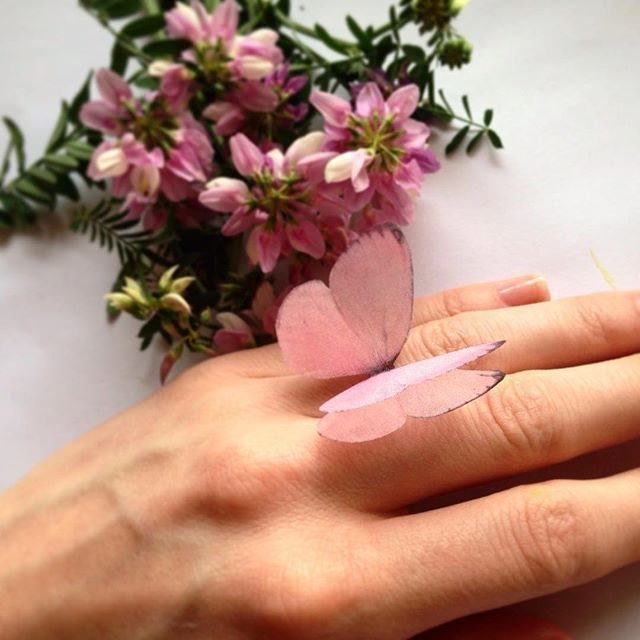 Close-up of Baby Pink Butterfly Ring with Silk Wings