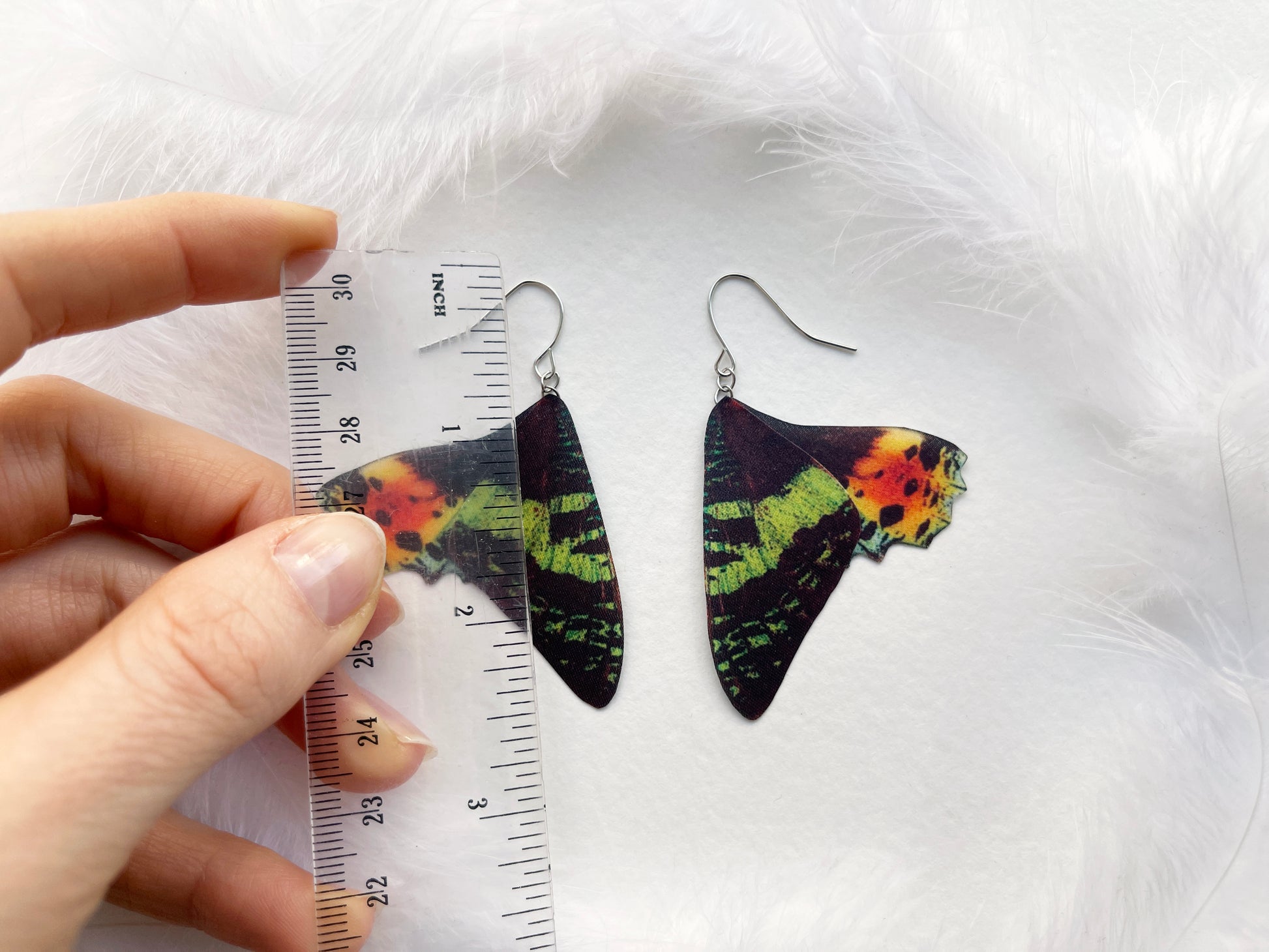 Whimsical moth wing earrings with a unique and edgy design