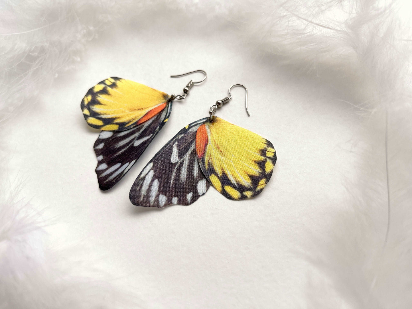 Quirky Earrings with Whimsical Butterfly Wings design