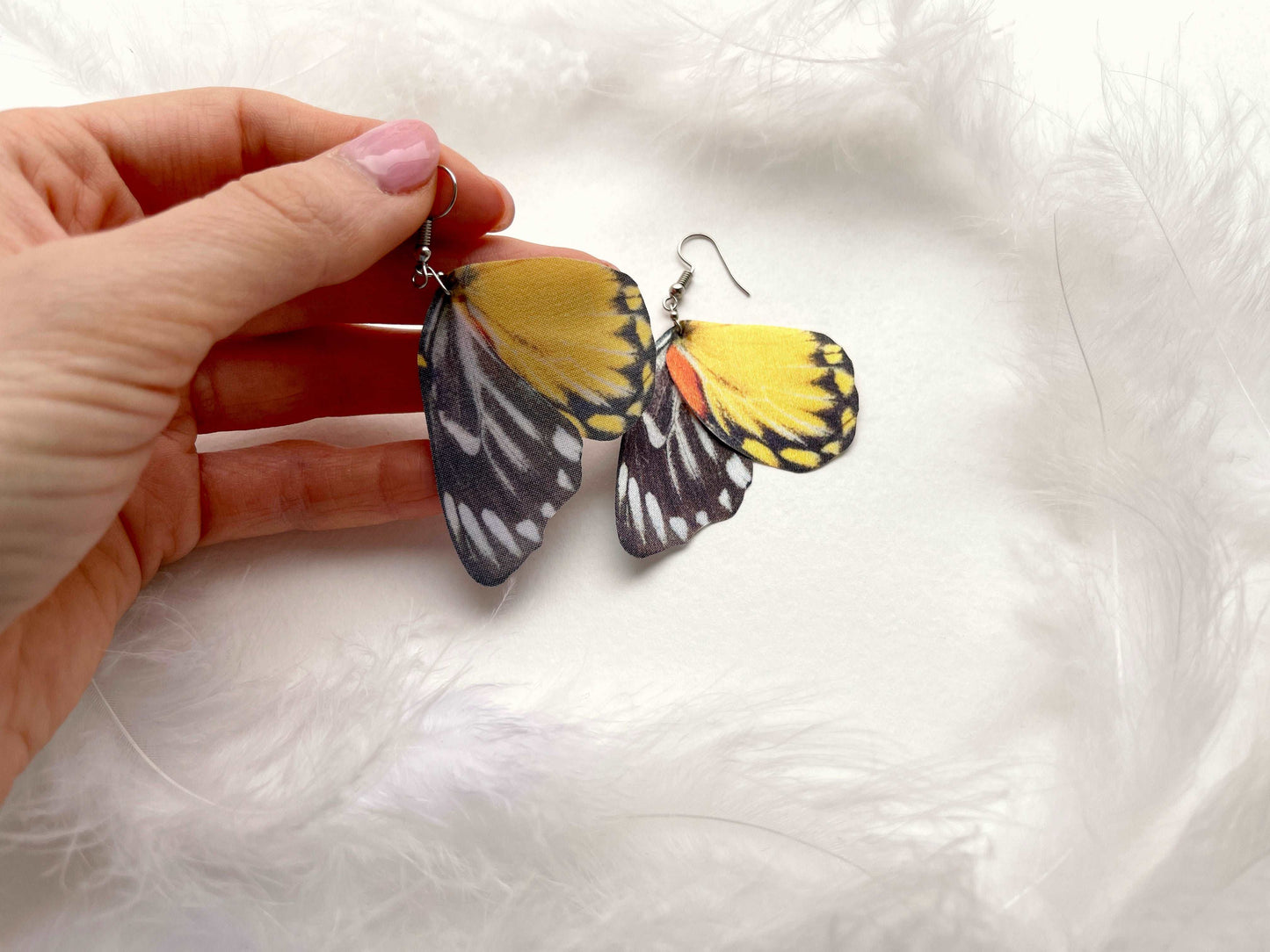 Unusual Earrings with Intricate Butterfly Wings design