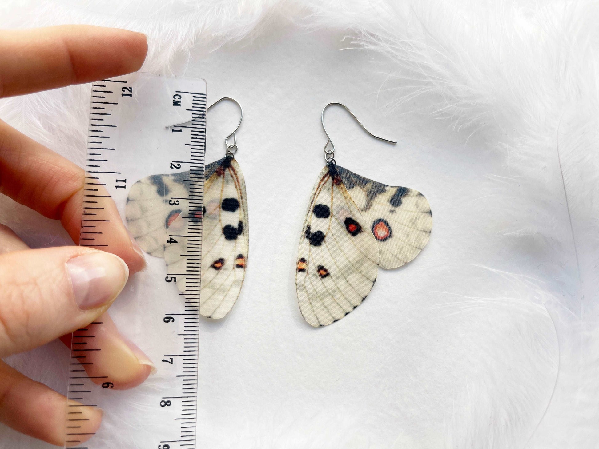 Cool bug earrings with butterfly wings