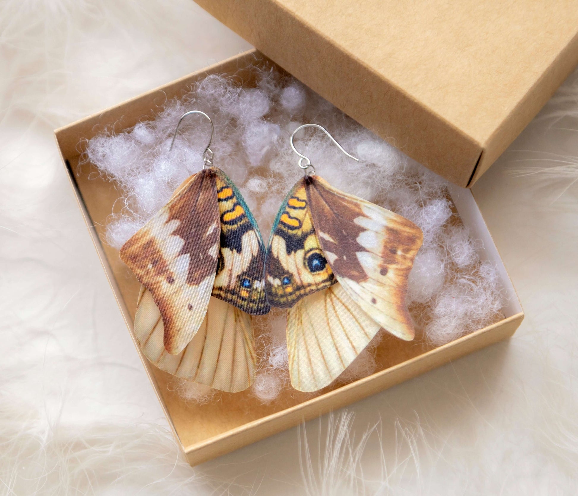 Bohemian style moth wing earrings with rustic charm