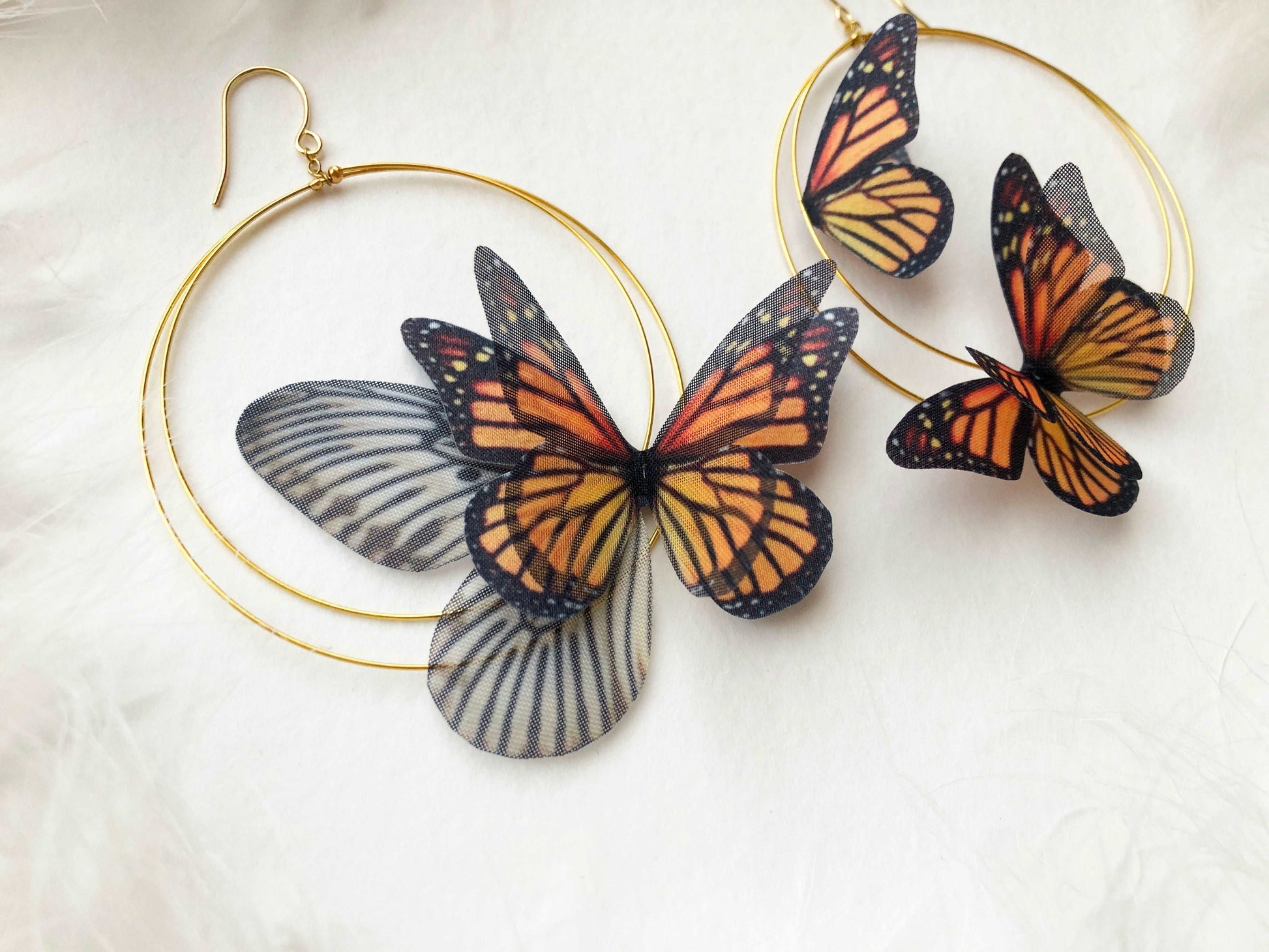 Monarch Butterfly Hoop Earrings from the side, showcasing the unique hoop shape