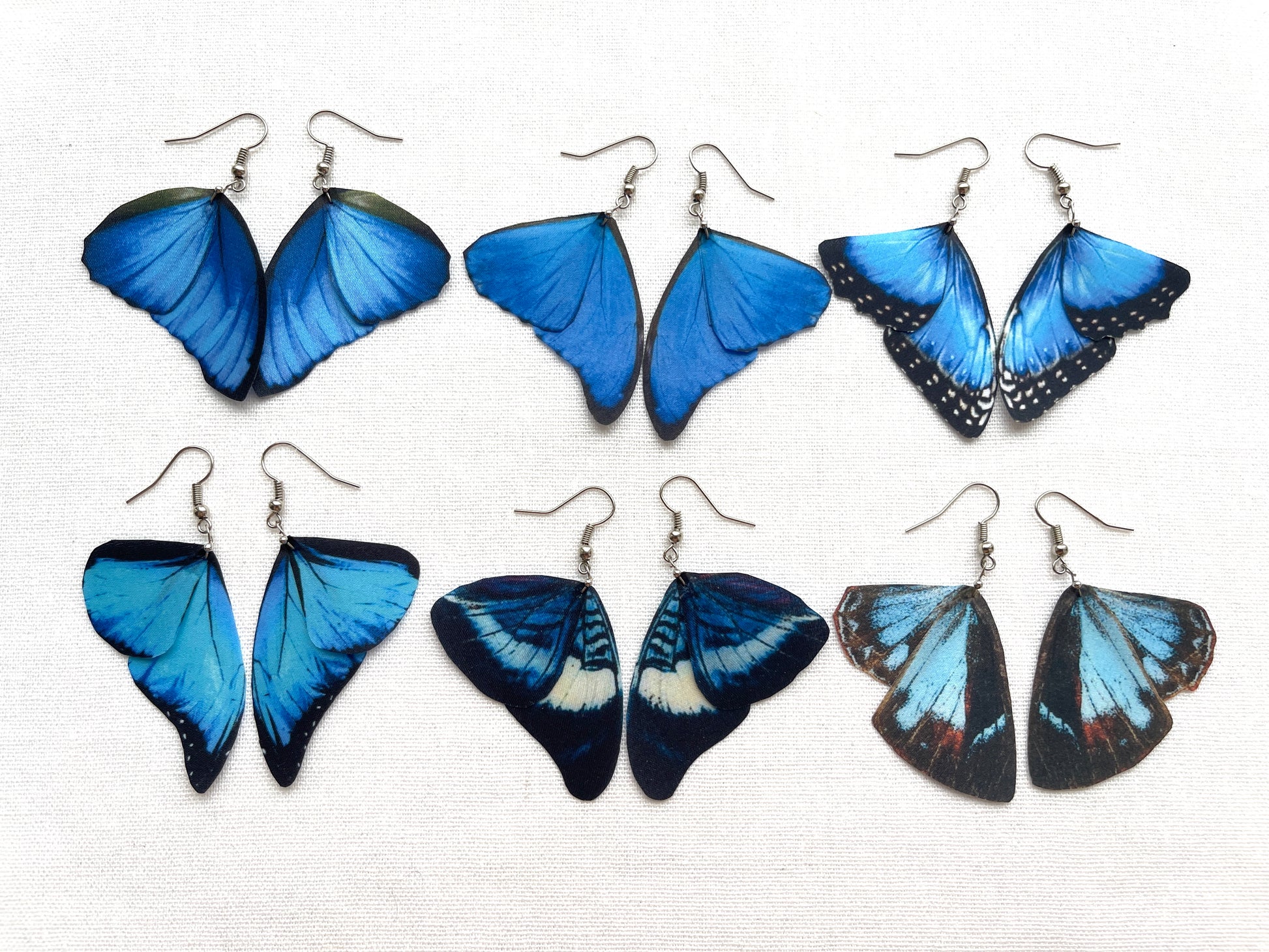 Boho-style fairy wing earrings in shades of blue