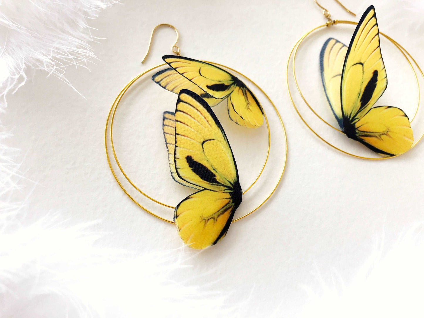 Double Hoop Earrings with Yellow Butterflies on White Background