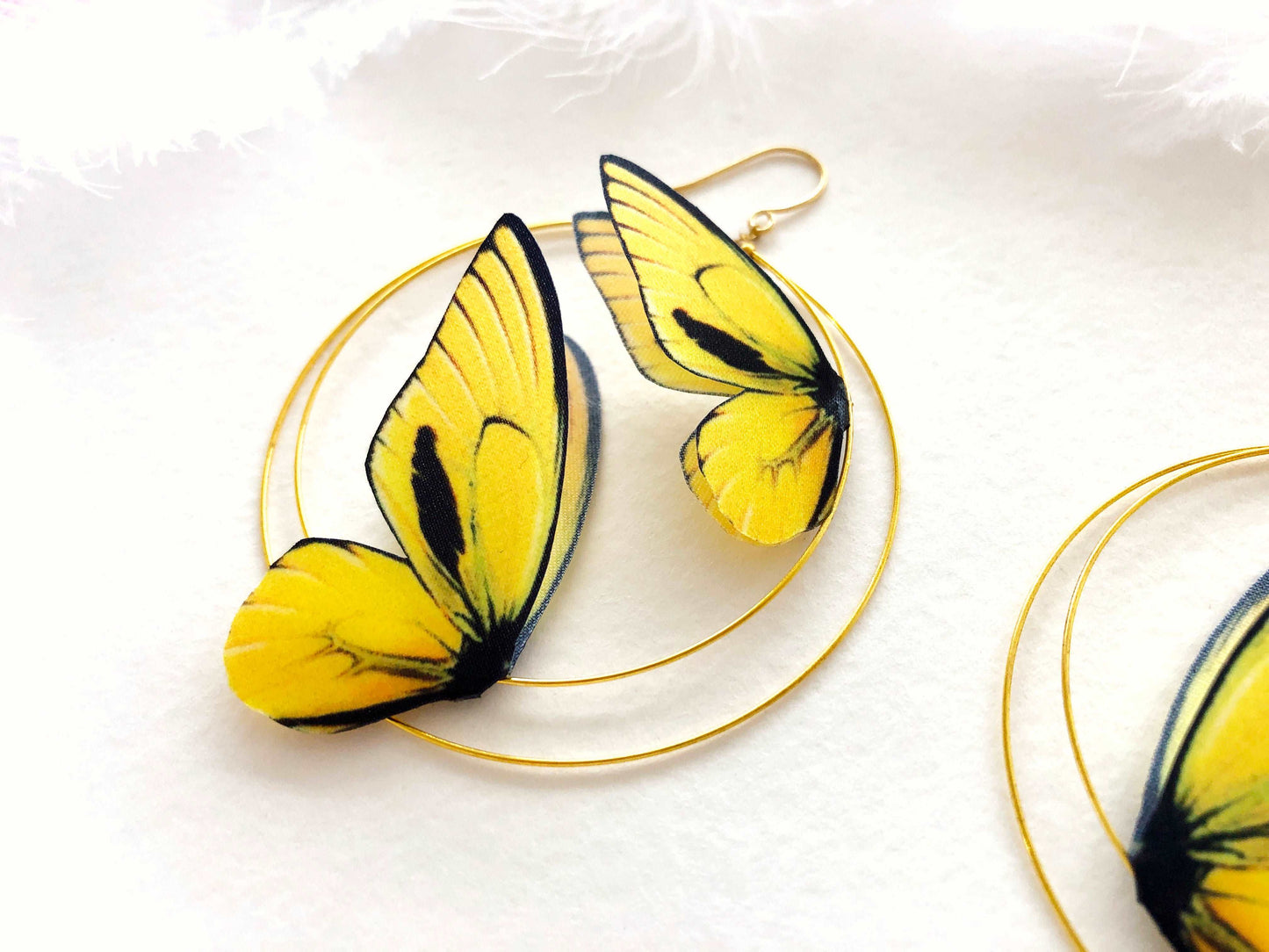 Hoop Earrings with Yellow Butterflies on White Background