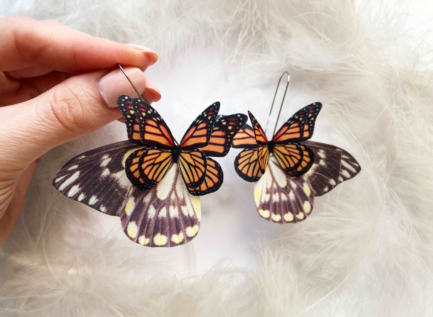 Symbolic monarch butterfly earrings for new beginnings