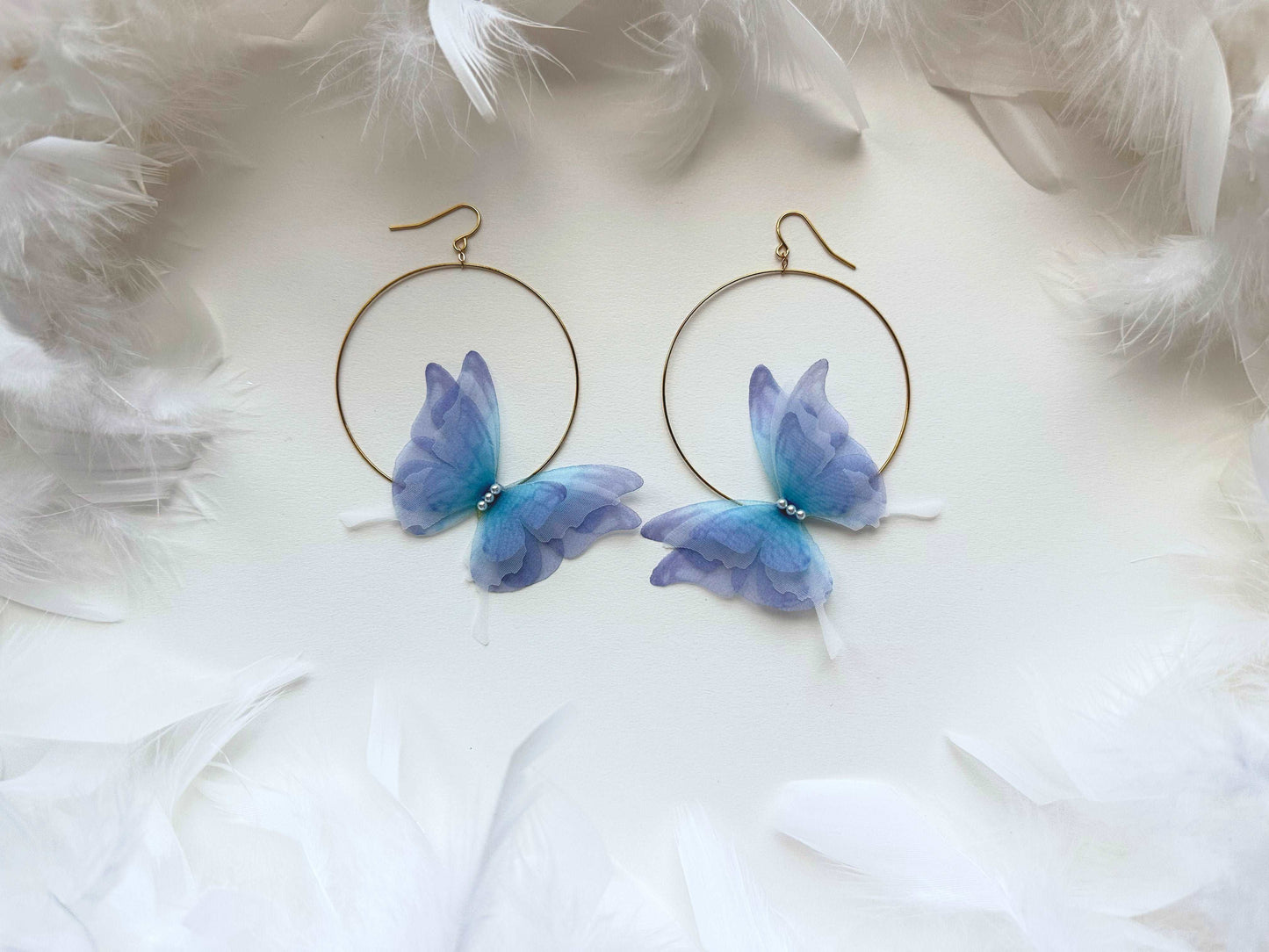 Lavender hoop earrings with butterflies