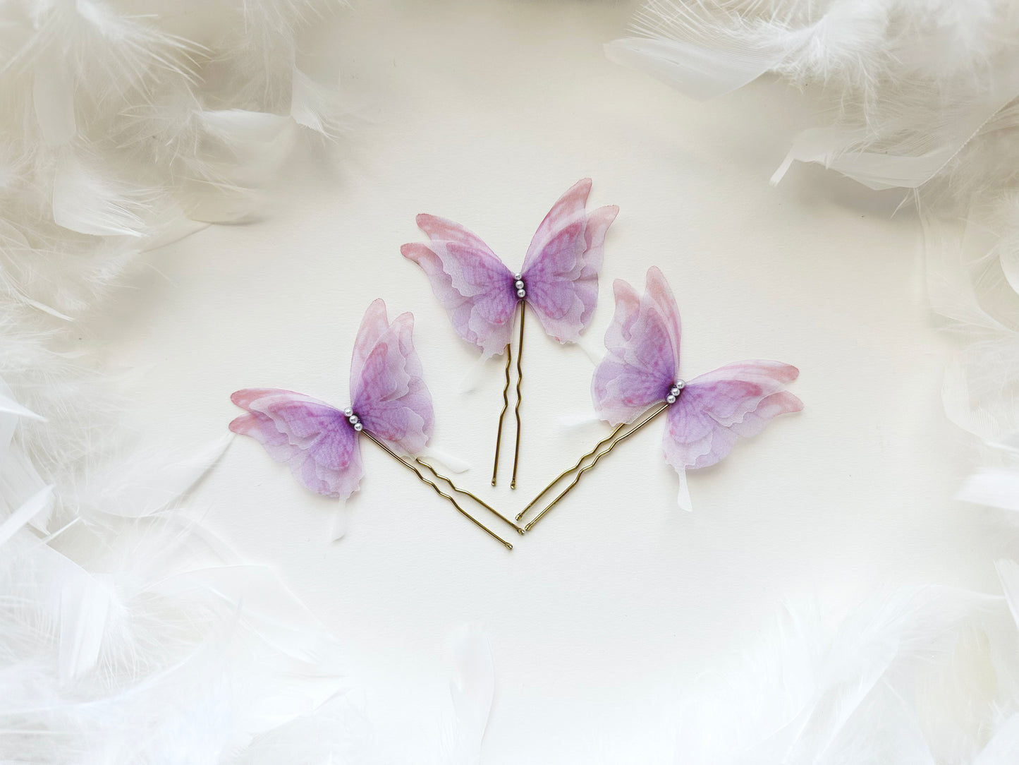 Soft lavender butterfly hair accessories for spring weddings