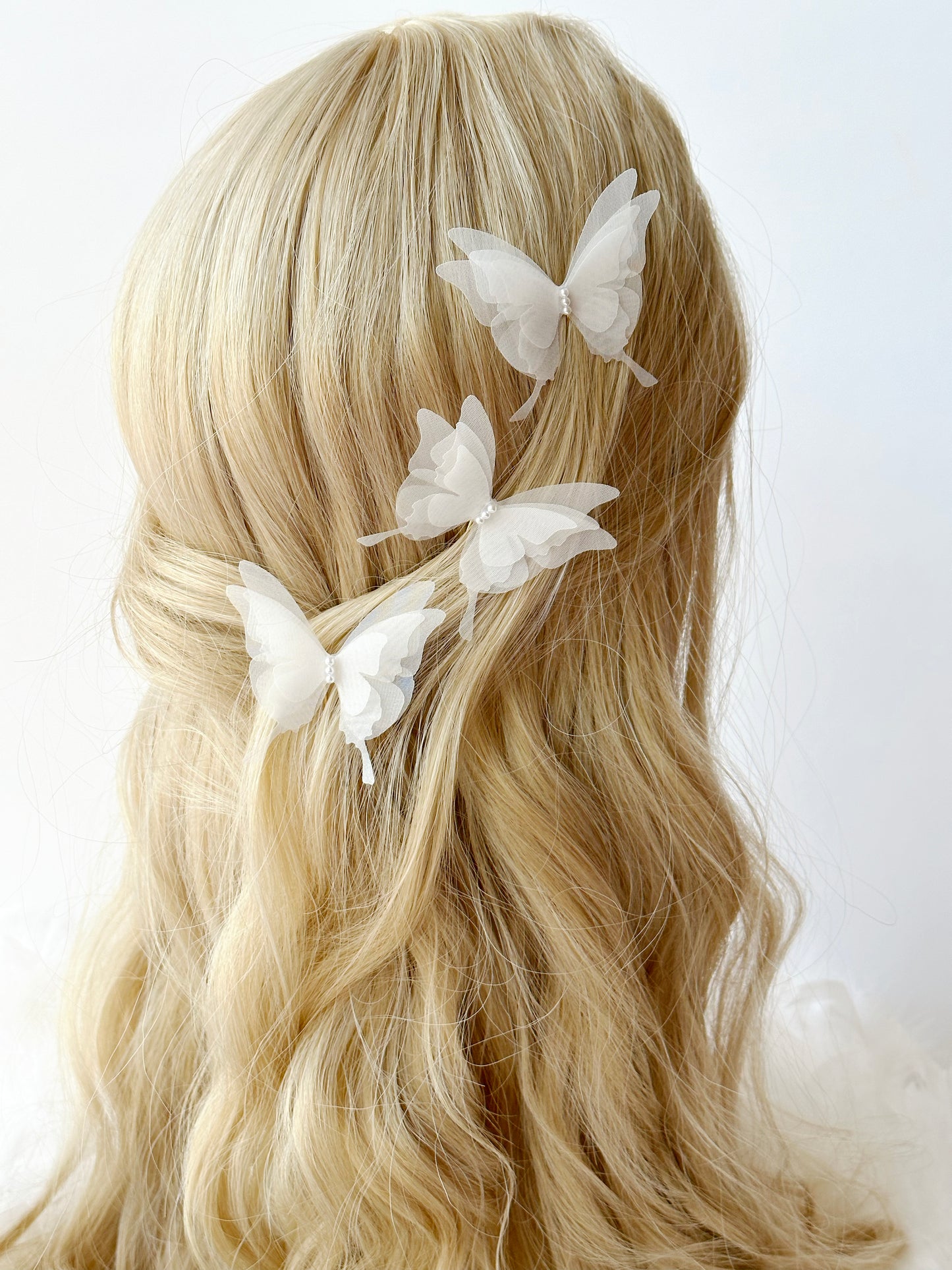 Elegant white organza butterfly hair clip with pearl details