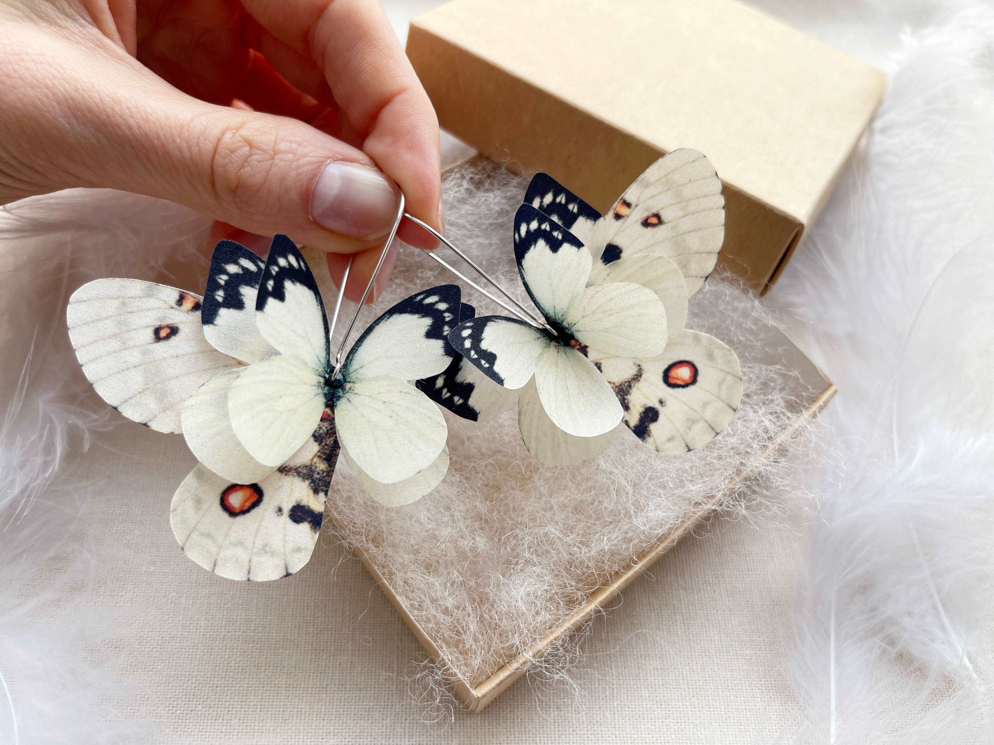 Dreamy ivory butterfly wing earrings for nature lovers