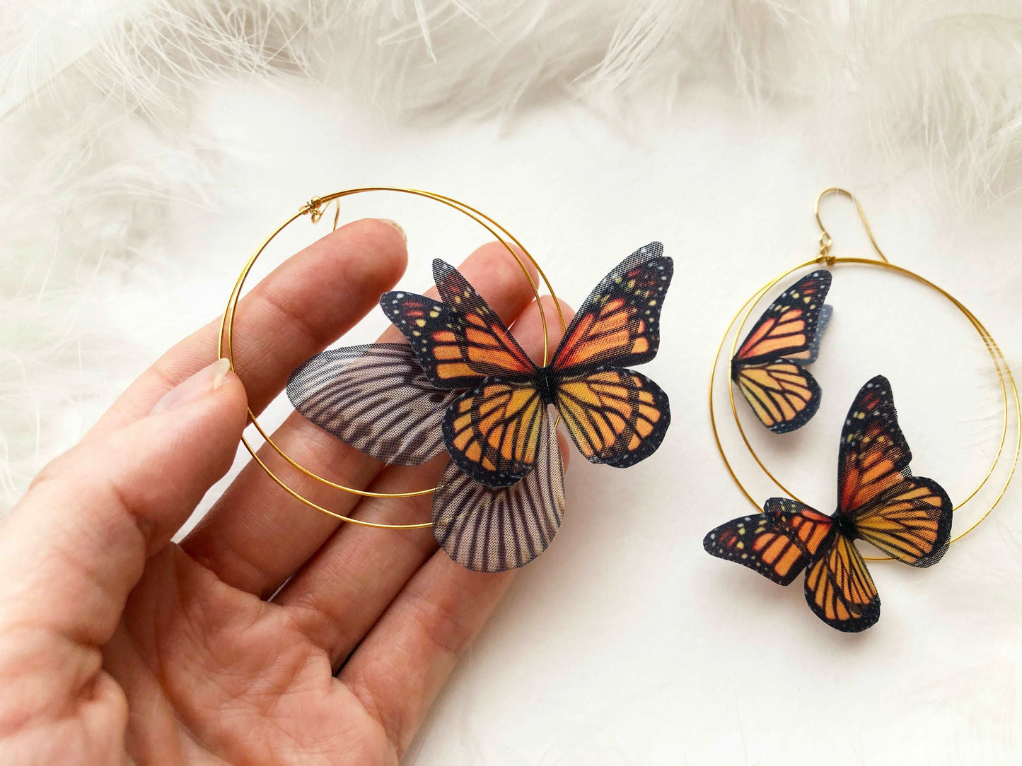 Monarch Butterfly Hoop Earrings from above, showcasing the lightweight gold-tone hoop