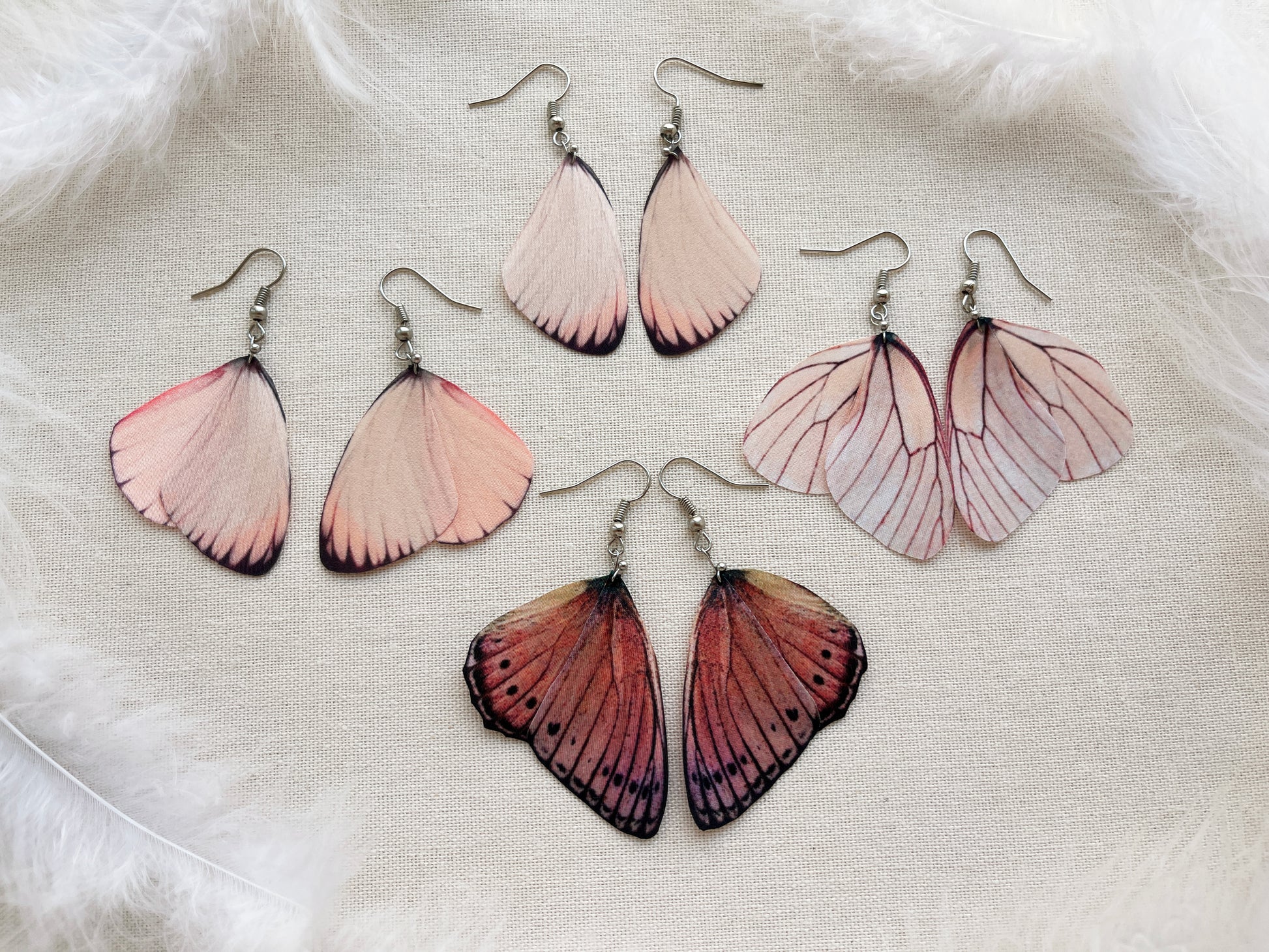 Blush Pink Earrings with Butterfly Wings - front view