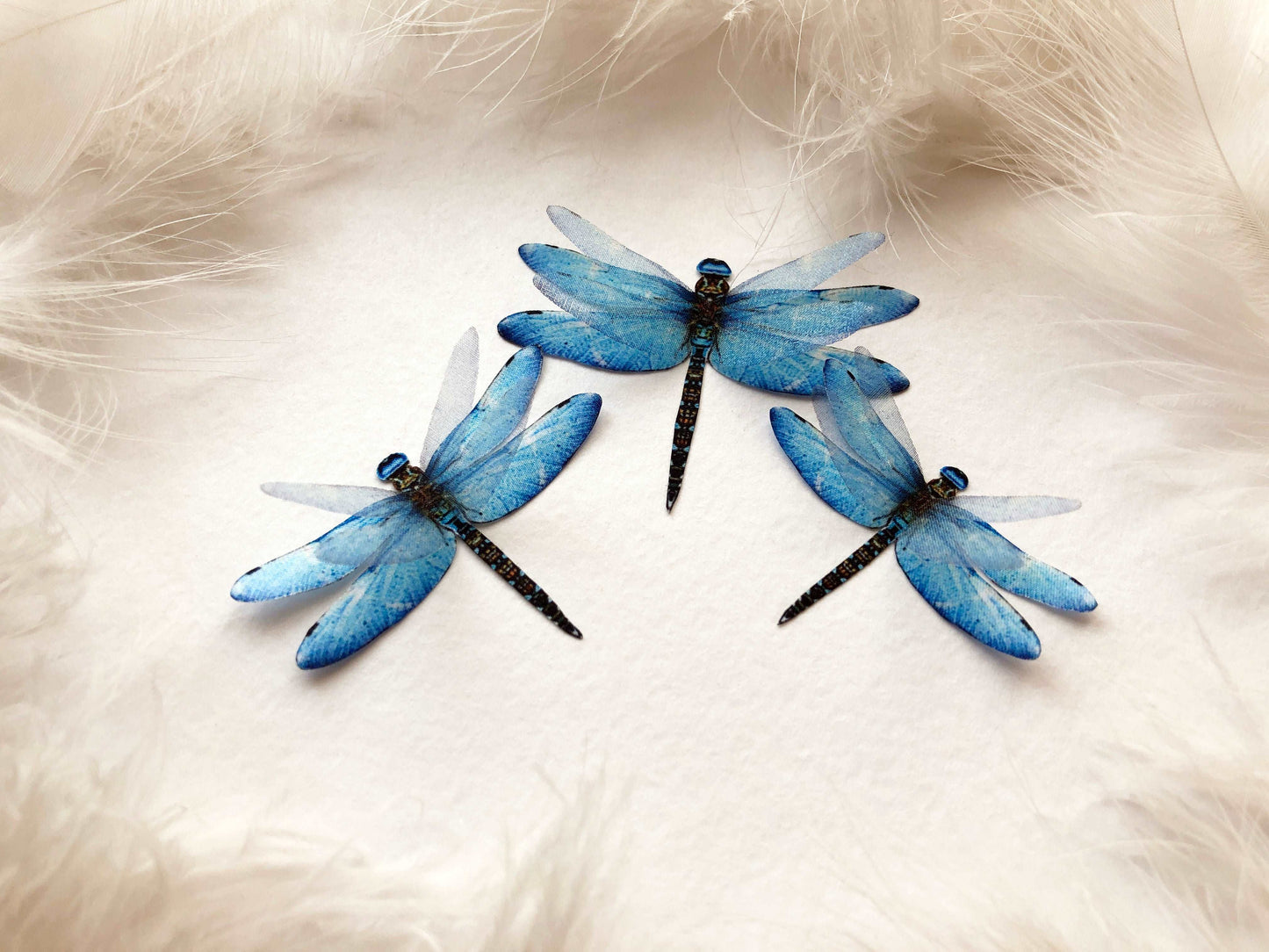 3 Blue Dragonflies Handmade of Silk on White Background with Feathers