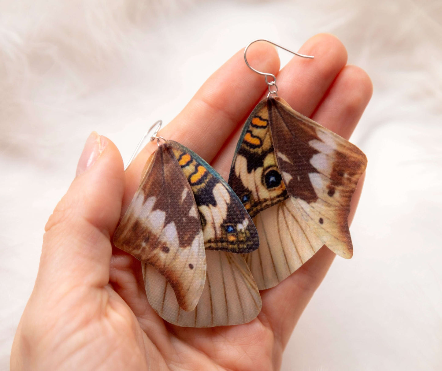 Rustic boho earrings featuring moth wings