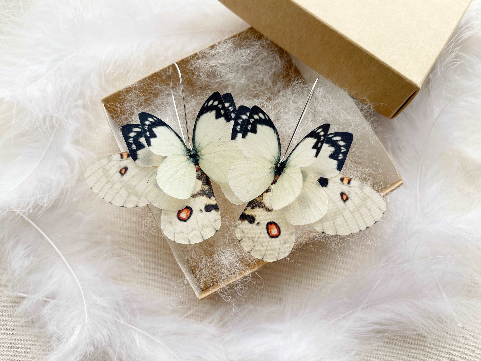 Boho style ivory butterfly wing earrings