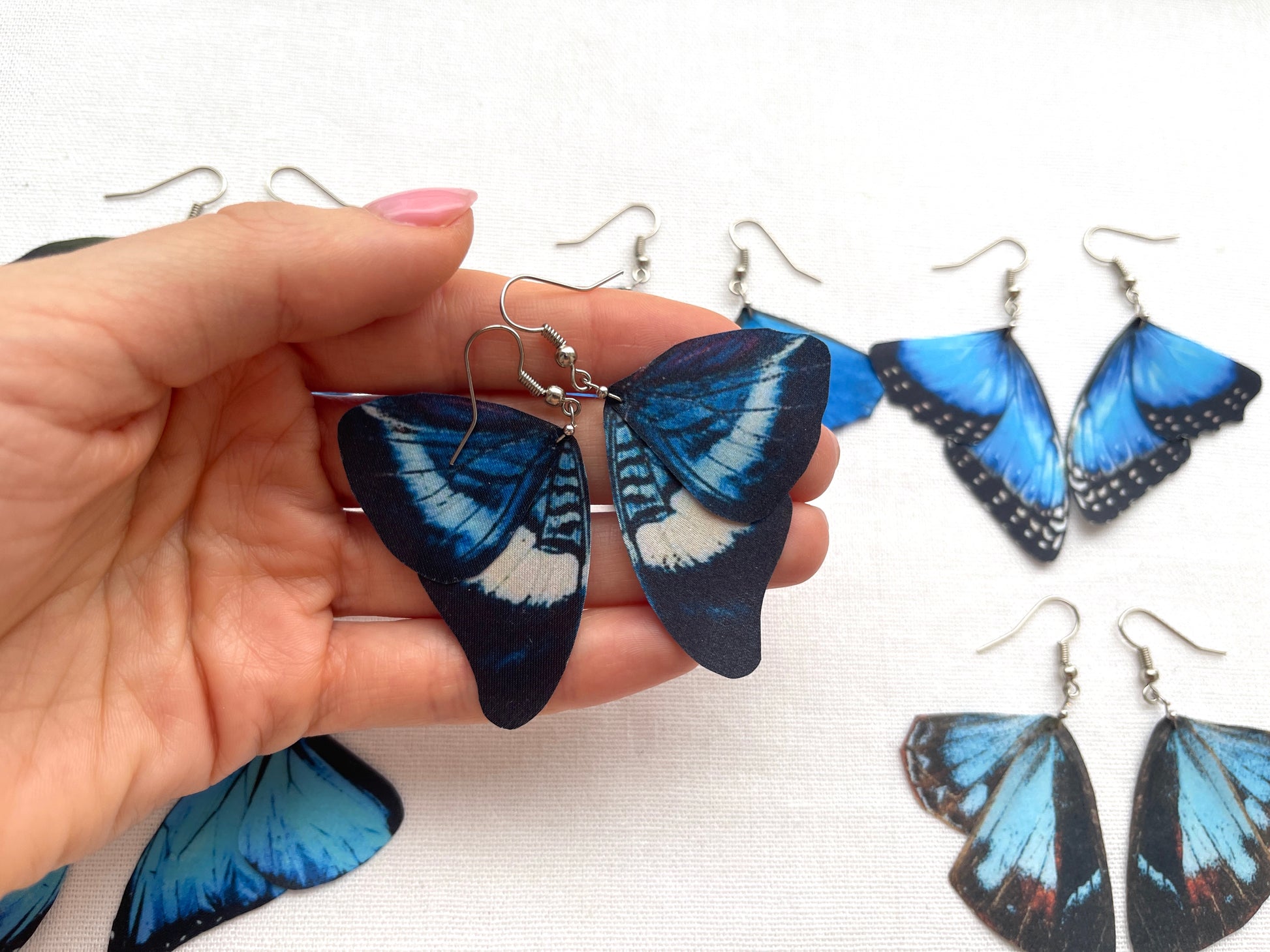 Light blue and royal blue butterfly earrings with a boho vibe