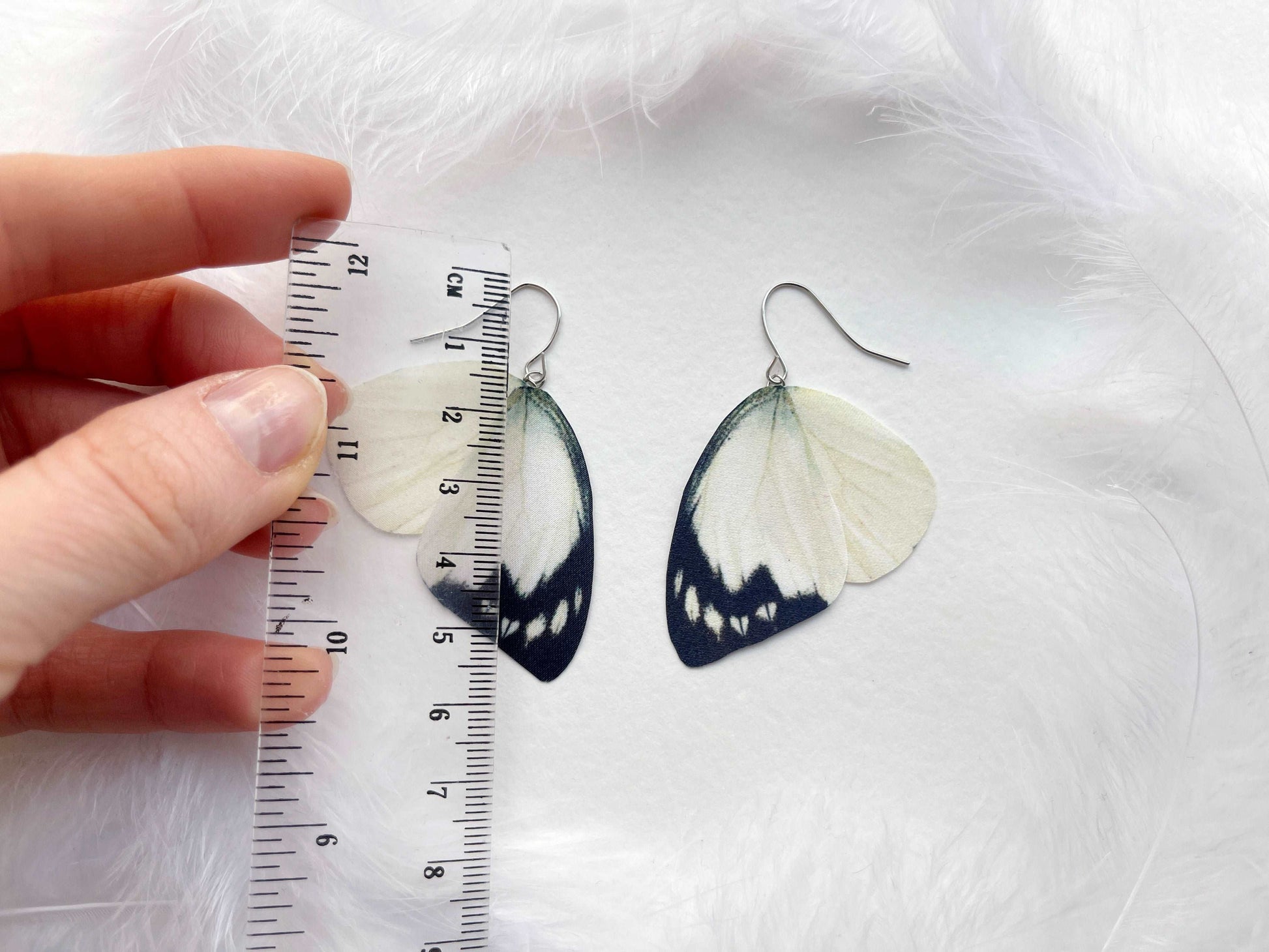 Ivory butterfly wings dangle earrings