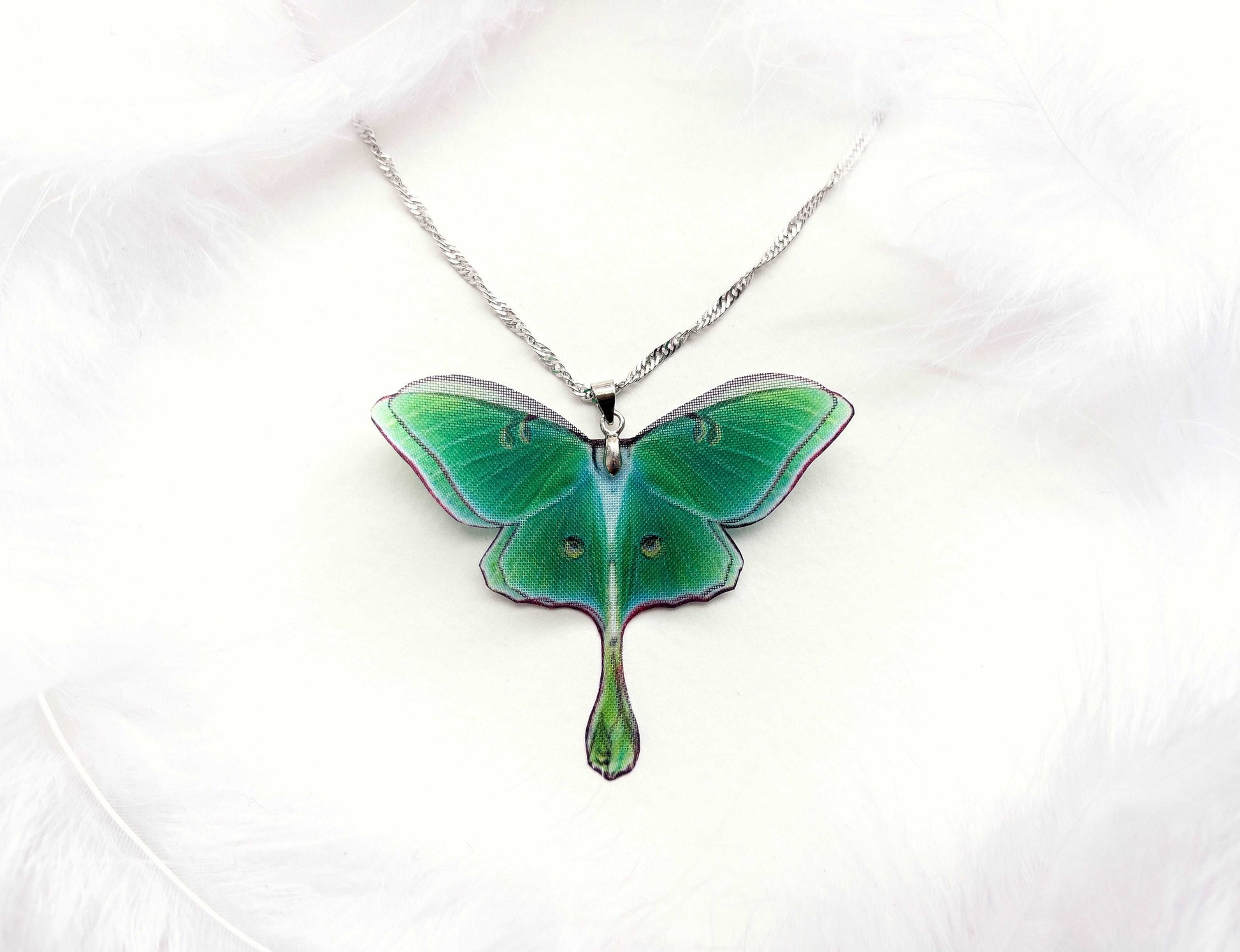 Green Lunar Moth Pendant with chain on a white background - Perfect for everyday wear or special occasions