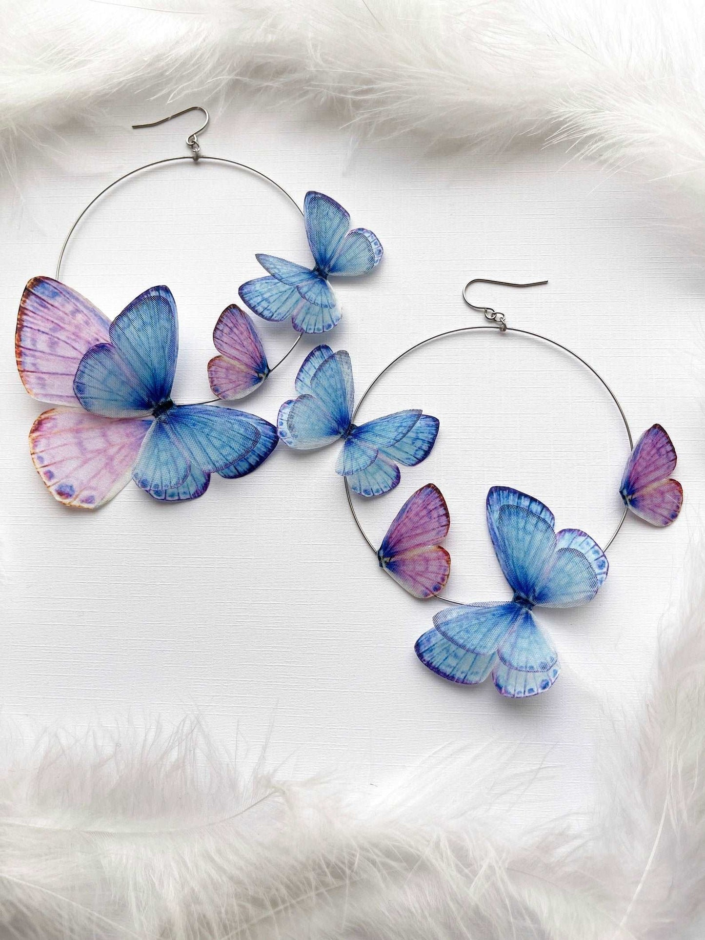 Butterfly Hoop Earrings on White Background