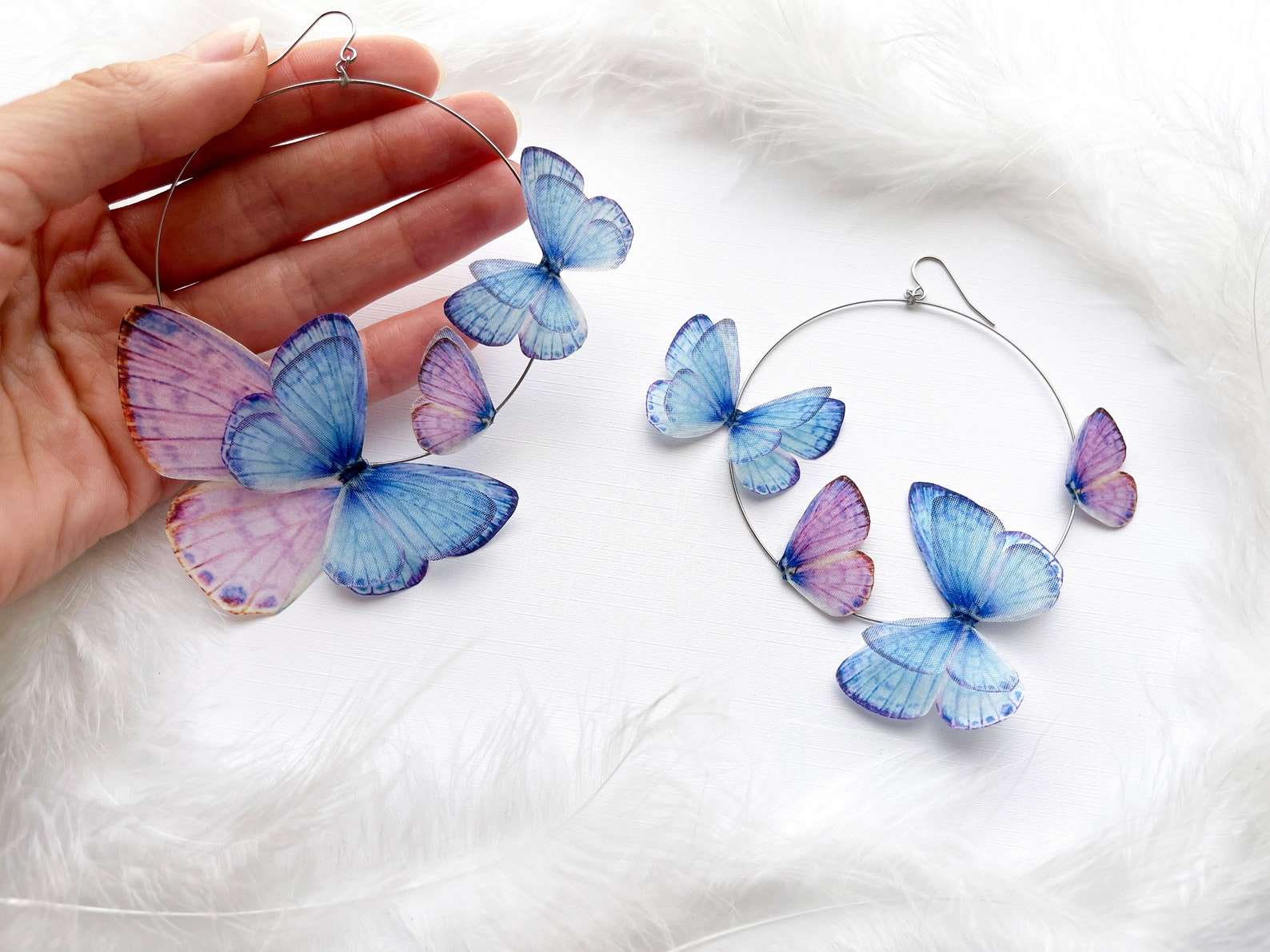 Cute and Stylish Earrings with Faux Butterflies on White Background