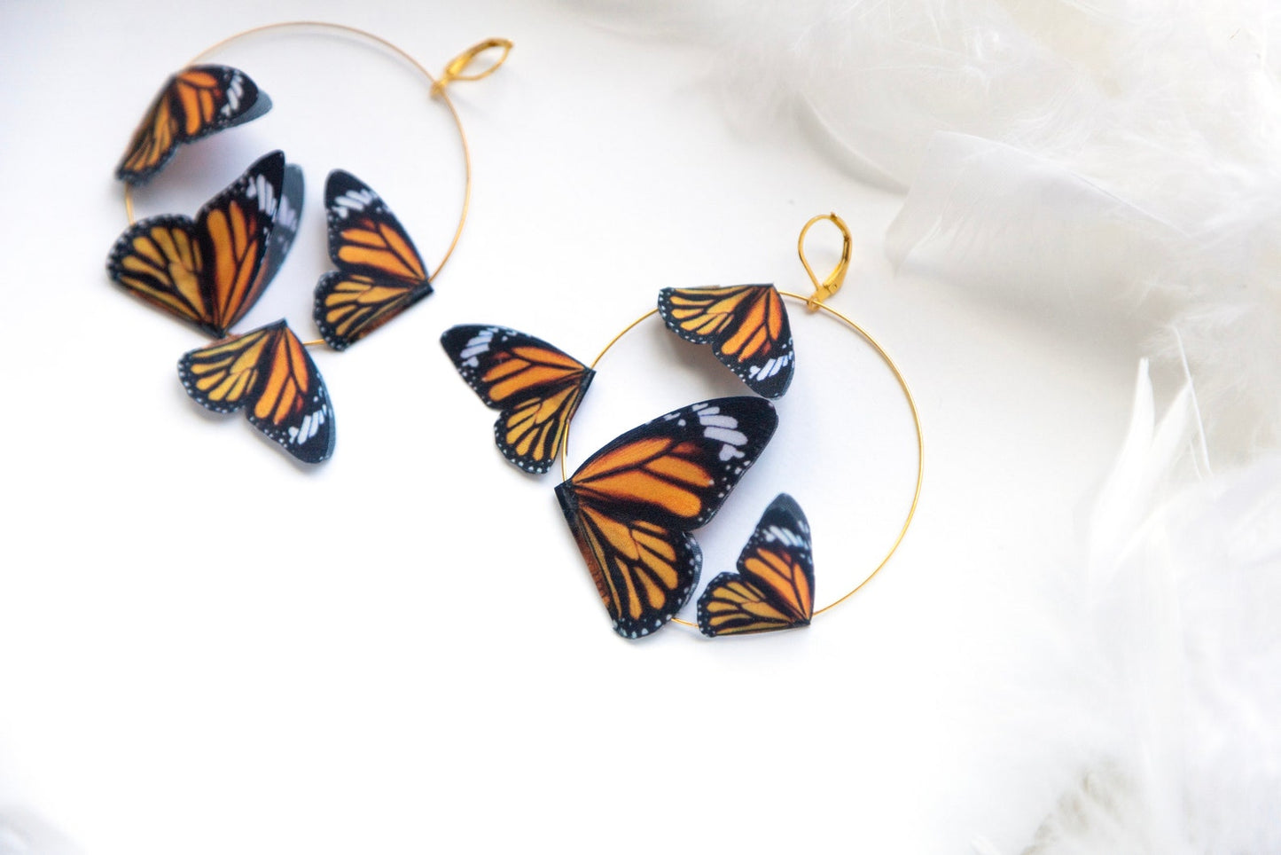 Hypoallergenic fairy hoop earrings with butterfly details