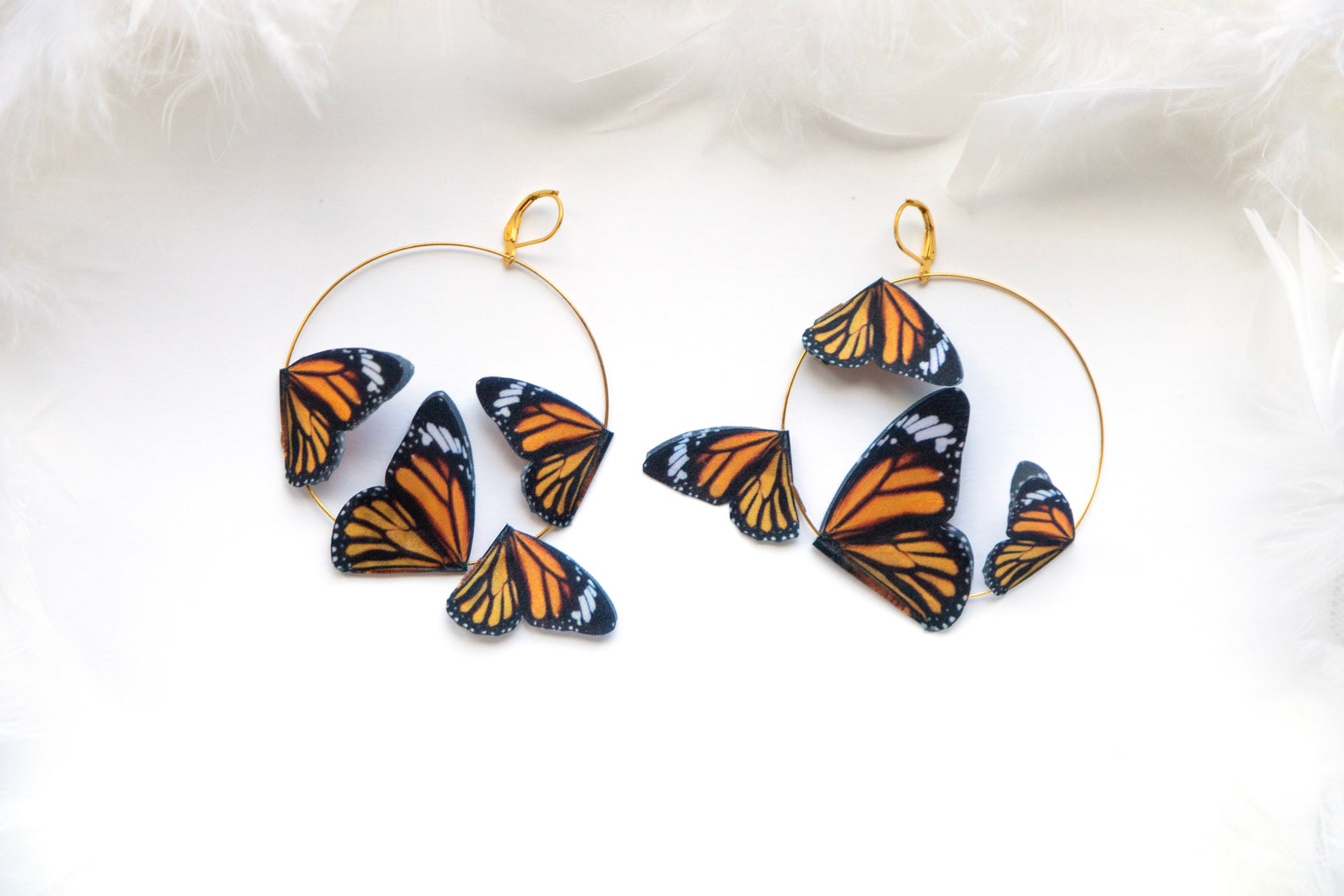 Butterfly lovers dream: gold hoop earrings with monarch charm