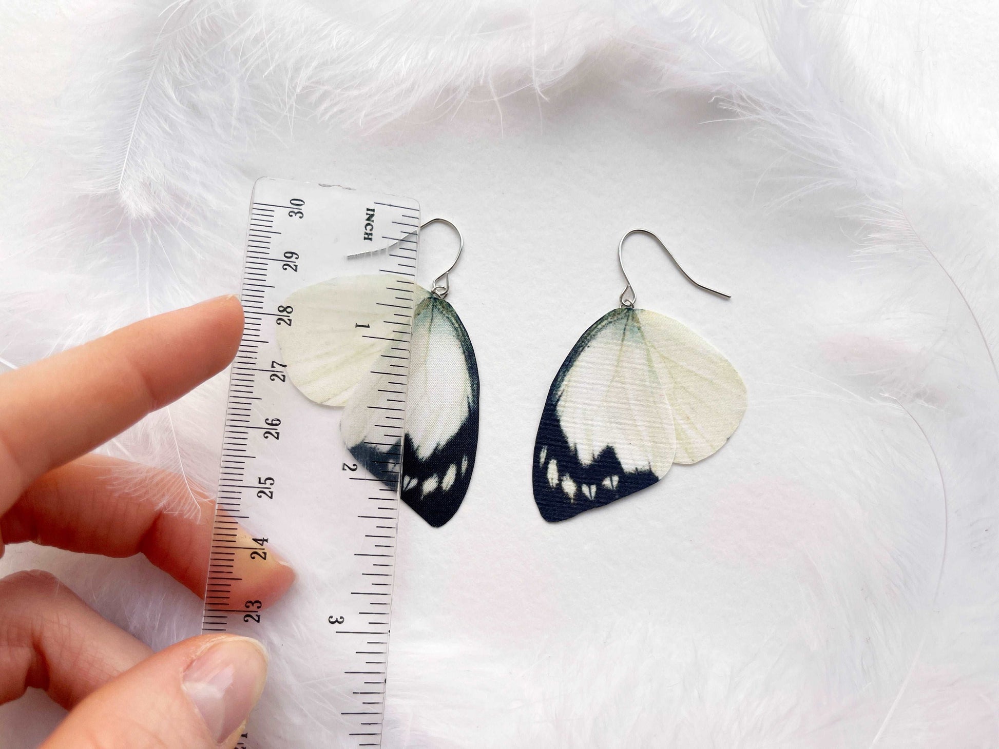 Ivory wings earrings for statement jewelry